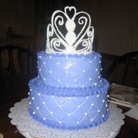 4 Year Old Princess this is for my dd 4th birthday. bottom layer is french vanilla with lemon curd filling and top tier is chocolate.Frosted in purple(her...