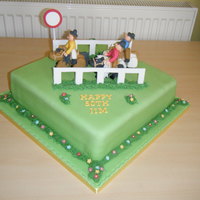 A Day At The Races 12" square sponge cake, decorated with fondant icing, everything is handmade, although I need a bit of practice on the horses.