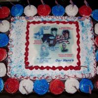 Our Hero's this cake was made for our families 4th of july celebration, the photo's are those who is now serving or has served in the military,...