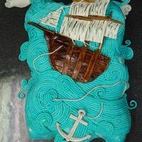 Ship Cake Made for my nephew's birthday. Found one like this on Flickr I believe. Buttercream frosted with gumpaste ship/anchor.