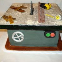 Table Saw Cake Made this for one of my husband's co-workers birthdays. He's a woodworker, and is obsessed with his table saw, so this is the...