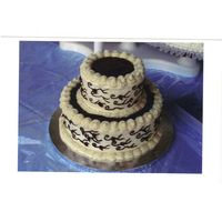 Cakes_003.jpg FIRST TRY AT A WEDDING CAKE FOR A FRIEND AT A SMALL BACKYARD WEDDING. THE CAKE IS CHOCOLATE WIYH CREAM CHEESE FROSTING AND CHOCOLATE...