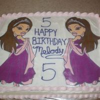Bratz Edible Image Birthday Cake This is a half sheet cake I made for my daughter's birthday party. It is half white, half chocolate and marbled in the middle. This is...