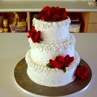 Martha_Steward.jpg 3 Tier cake as seen in a Martha Steward Reciepe book.All done in buttercream.