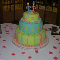 Anna's Wedding Cake! Fondant covered wedding cake in lime green, turquoise, and hot pink! Marge and Homer Simpson topped the cake, which was for a dear friend&#...