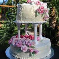 Wilton 3 Final Bottom is 10" carrot cake. Top is 6" chocolate. Both with cream cheese frosting with Cornelli lace. The roses are fondant w/ gum-...