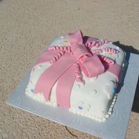 Wilton 3 Present Cake Satin Ice White Fondant with fondant bow and flowers