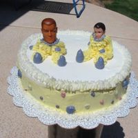 Wilton 1 Clown Cake I didn't want to buy the clown heads, so my son gave me some of his doll heads.