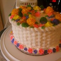 First Basketweave this is my first cake with tons of flowers and basketweave. I hate making violets. maybe it's because I'm a southpaw.