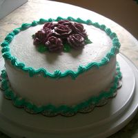 First Rose Cake this was made at my course 1 wilton class at my local michael's. I used buttercream icing.