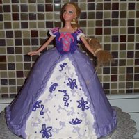 Tangled Cake This was made for my Great Niece on her 4th irthday. It was carved rather than using the doll pan. I love making these..but more...