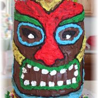 Tiki Cake This Is a Tiki cake I did for a Luau we had for my sisters Birthday. Its 5, 6in rounds stacked. Chocolate icing and wilsons decorating...