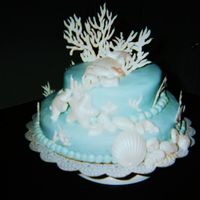White Chocolate Dream This cake has 1 1/2lbs of whit chocolate on it...All shells and coral are made of wc...Used mff..cake is yellow/choc marble...i think i...