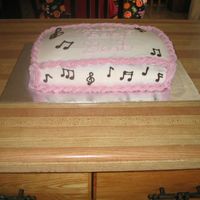 First Baby Shower Cake. Notes are made of chocolate.