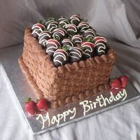 Chocolate Strawberry Birthday Chocolate cake with whipped white chocolate ganache filling, chocolate buttercream and chocolate dipped strawberries.