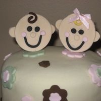 Baby_Shower_003.jpg Twin baby faces made out of fondant.