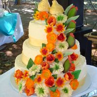 Painted Garden This was a wedding cake that I did for a wedding this past weekend. Everything on the cake is made out of fondant, right down to the quail...