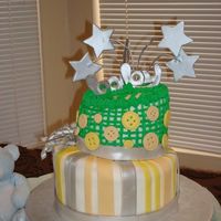 Whimsical Baby This was a baby shower cake for someone that wanted the cake to match her crib set. It was pale yellow and green gingham. The cake was a...