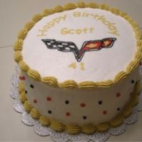 Corvette Logo This cake is for my brother's 41st Birthday...he's a Corvette nut. It's my first attempt at FBCT. Cake is dark choc. with...