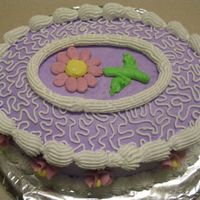 Cornelli_Lace_2.jpg Trying my hand at cornelli lace. I really enjoyed it and next time, I'll attempt a whole cake with it on there. The cake is lemon with...