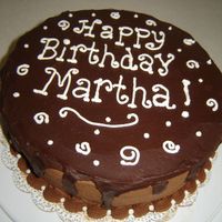 Chocolate Ganache Cake Toba's yellow cake, fudge icing covered in chocolate ganache