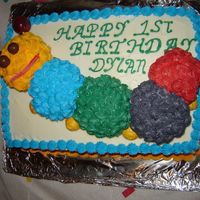 Baby Einstein Cake Did this for my little boys 1st birthday! It was a lot of fun to make! Used swirls instead of the star tip.