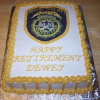 Police Cheif Retirement 1/2 sheet iced in BC, edible image scanned from uniform patch.