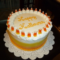 Candy Corn Cake This is a simple buttercream frosted cake, designed after the colors of candy corn.