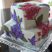 Lilac Birthday/mother's Day Cake Chocolate cake w/raspberry filling, MMF, buttercream fondant flowers.