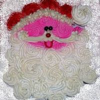 Santa I was a bit lazy on this one. I used wilton color mist red (the picture looks better then in real life ha.) The pink was a bit much ha......