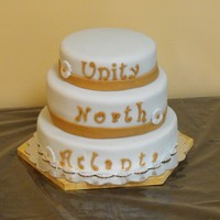 Unity North 3 Tiered Cake 3 tiered french vanilla cake with almond cream & fondant to cover. Fed ~150 for a church event.