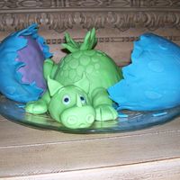 Baby Dragon Cake Debbie Brown design. Made for my son's 5th birthday. dark choc cake and fondant.