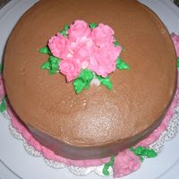 Buttercream Roses I made this in a Wilton 1 course. The buttercream is a little sweet for me, so I added cocoa powder. It makes it a more chocolatey flavor,...