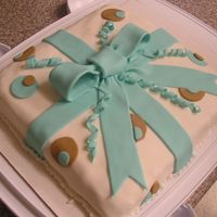 Present Birthday Cake A two layer square cake with Satin Ice fondant.