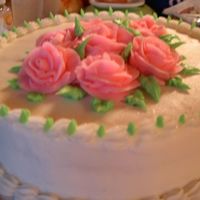 Final Cake For Course 1 My instructor showed me how to add the leaves in the border and I think it makes the cake.