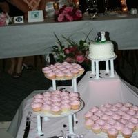 Wedding Cake And Cupcakes 6" carrot cake with super sweet frosting, I can't remember what it was called. Plus 250 vanilla cupcakes, frosting is a simple...