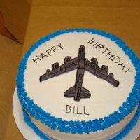 B52 Birthday Cake Chocolate Cake, White BC Icing, and that is supposed to be a B52 Bomber on top