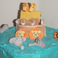 Noah's Ark 10" square, covered in BC, with gumpaste noah's ark and animals. First time sculpting figurines.