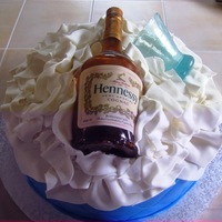 Hennessy Cake vanilla cake with almond filling, covered with fondant, isomalt hennessy bottle and glass