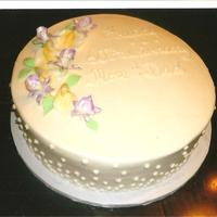 Orchids And Calla Lillies This was for a 60th anniversary. Client wanted just a few flowers and dots on the sides. She was pleased. I need to charge more money...