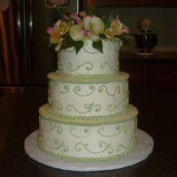 Scroll Cake Bride wanted this cake to have fake flowers on it. Chocolate cake with peanut butter filling.