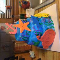 Deep Sea Fun Cake this cake was for my Daughters 3rd Birthday colorflow pieces and buttercream icing. Everybody loved the cake I was happy with how it turned...