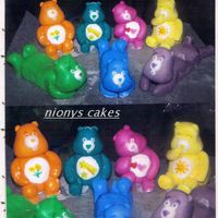 Care_Bears.jpg i made these care bears for a girls birthday party i placed them on a cake its my first time using fondant and making them to look like the...