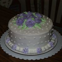 Wilton 1 Final Cake Double layer golden yellow cake torted and filled with cheesecake mousse. Iced in bc. Was going for the professional look since my kids are...