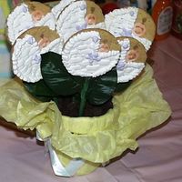 Baby Flower Cookies I posted a pic of the cookies the other day before the final assembly. This is the final assembly of the sugar cookies iced with RI. Design...