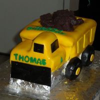 Dump Truck Cake Chocolate WASC with buttercream icing, covered in fondant. My first using an airbrush on fondant, love it!