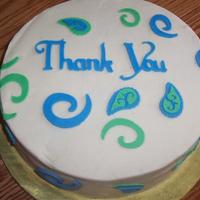 Thank You Cake Chocolate cake with vanilla buttercream. Didn't do a very good job smoothing. Fondant/gumpaste mix shapes made on cricut cake.