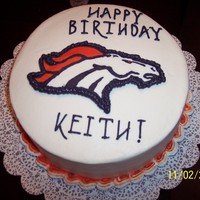 Denver Broncos Fbct 8 in round cake with Denver Broncos logo done in FBCT.