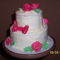 Petite Rose Cake This is a small stacked cake (6 and 4 inch) I made for my grandmother's birthday. First time making fondant ribbon roses and leaves,...