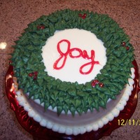 Christmas Wreath Cake Eggnog flavored cake I made for my Sunday School Christmas party. It's iced in mashmallow creme butter cream icing and the sparkly...